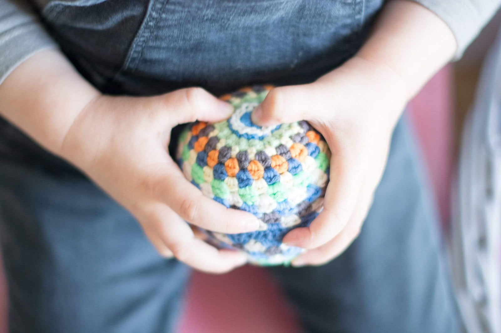 bebemoss.com toy multicolore Rainbow rattle ball handmade by moms  gifts with purpose